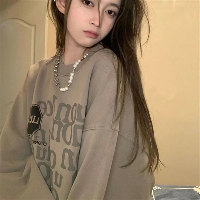 Áo Len Cotton Tay Dài Cổ Tròn Dáng Rộng Phong Cách Hàn Quốc Thời Trang Thu Đông Cho Nữ