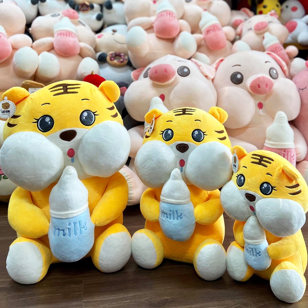 Gấu bông Cọp bông ôm bình sữa
