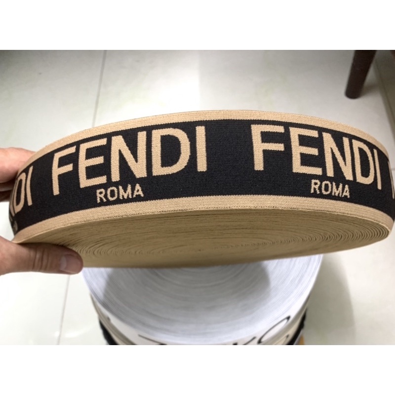 Thun dệt chữ may lưng quần 5cm.