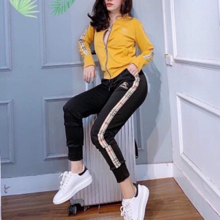 Bộ thể thao nữ khoá kéo quần dài phối sọc kẻ
