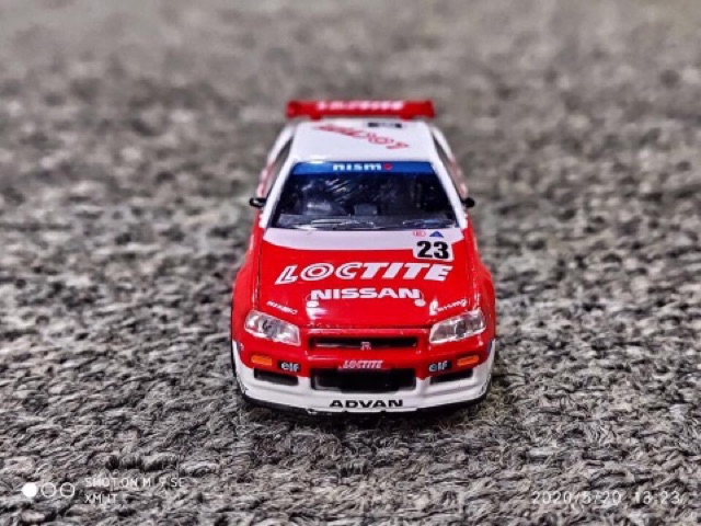 Xe Mô Hình Nissan Skyline GT-R (BNR34) 1999 1:64 GreenLight ( Trắng Đỏ )