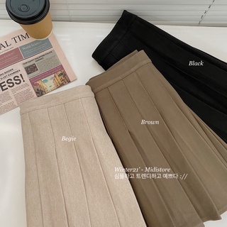 Chân váy dạ xếp ly