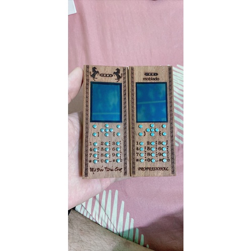 điện thoại nokia 6300 vỏ gỗ hương.