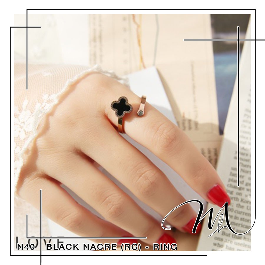 Nhẫn nữ hở Titan không gỉ freesize hình hoa 4 cánh xà cừ đen độc đáo - Măng’s House N40