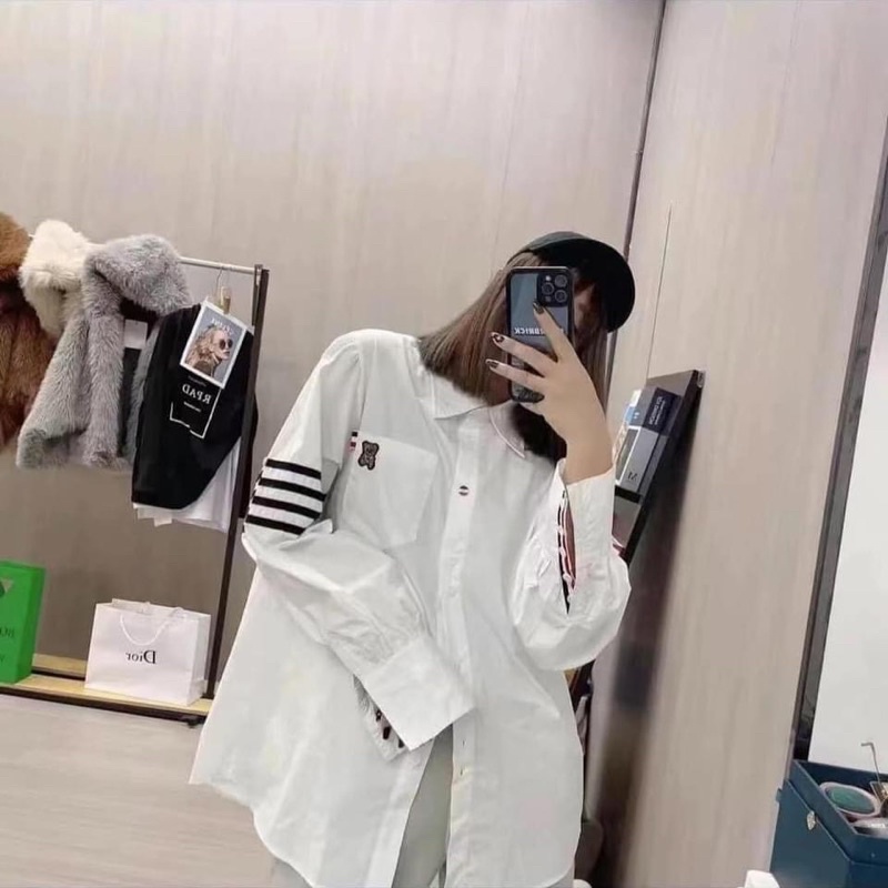 Áo sơ mi viền tay túi gấu