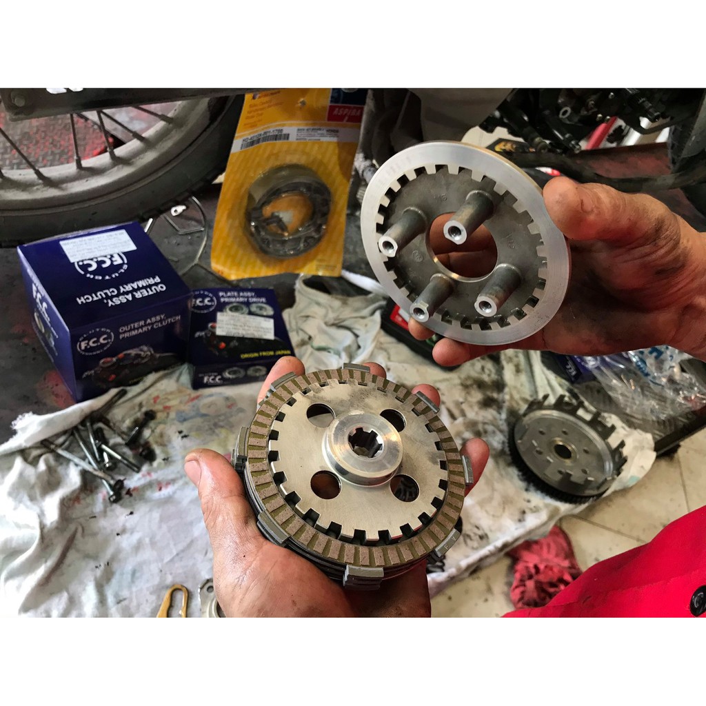 A5  bộ Lá bố nồi và Lá sắt FCC Yamaha Exciter 2009 - 2010 Xe 4 Xe Số col tự động