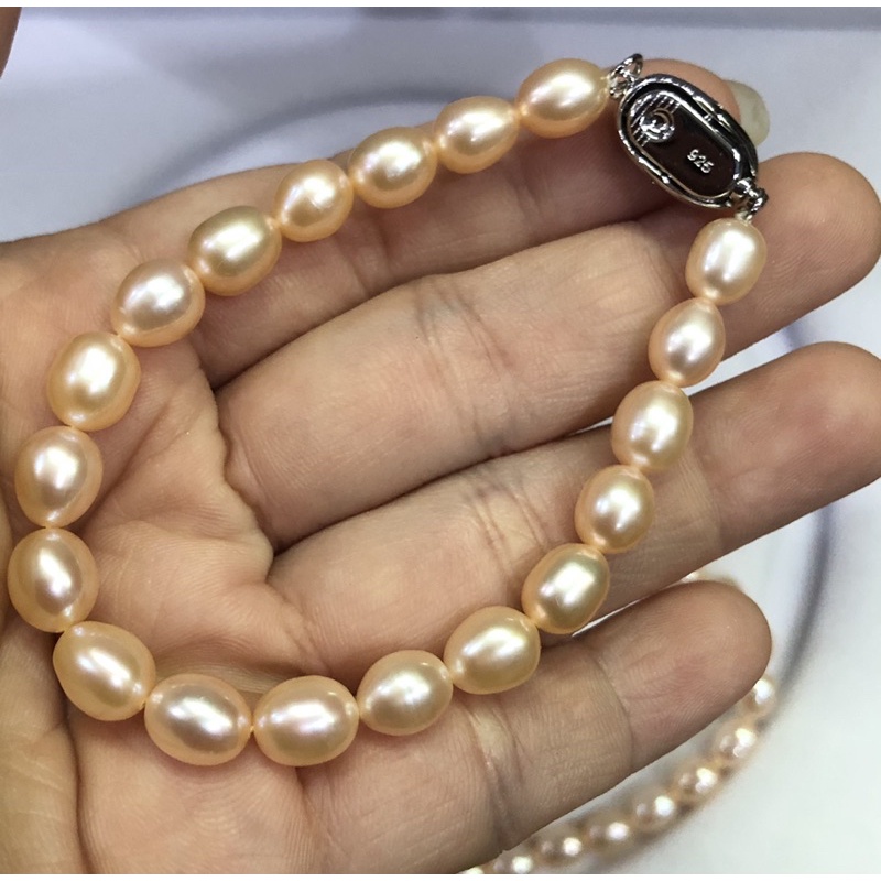 Vòng tay hạt 7-8ly khóa bạc màu hồng cam