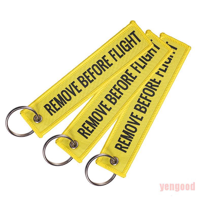 Móc khóa thêu chữ REMOVE BEFORE FLIGHT nhiều màu tùy chọn