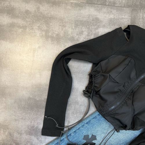 In the spring of 2022, the collar shoulder-exposed long sleeve pocket bag is decorated with drawstring and cool street shirts.