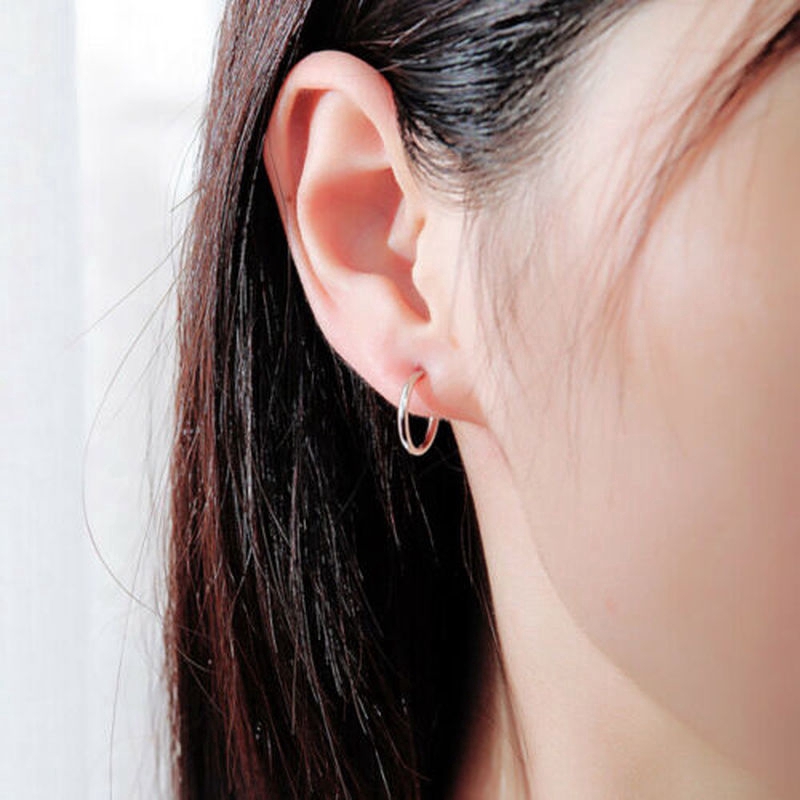 Đôi khuyên tai bằng hợp kim tròn có thể tháo gỡ có thể dùng làm khuyên mũi/môi