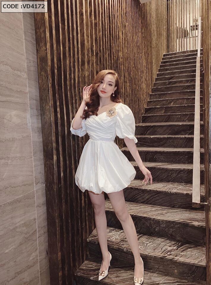 Đầm trắng xòe kết hoa vải lụa tùng trái bí
