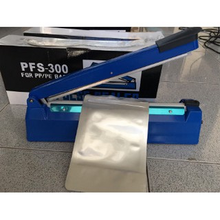 Máy dán, hàn miệng túi nilon , đóng gói thực phẩm dập tay