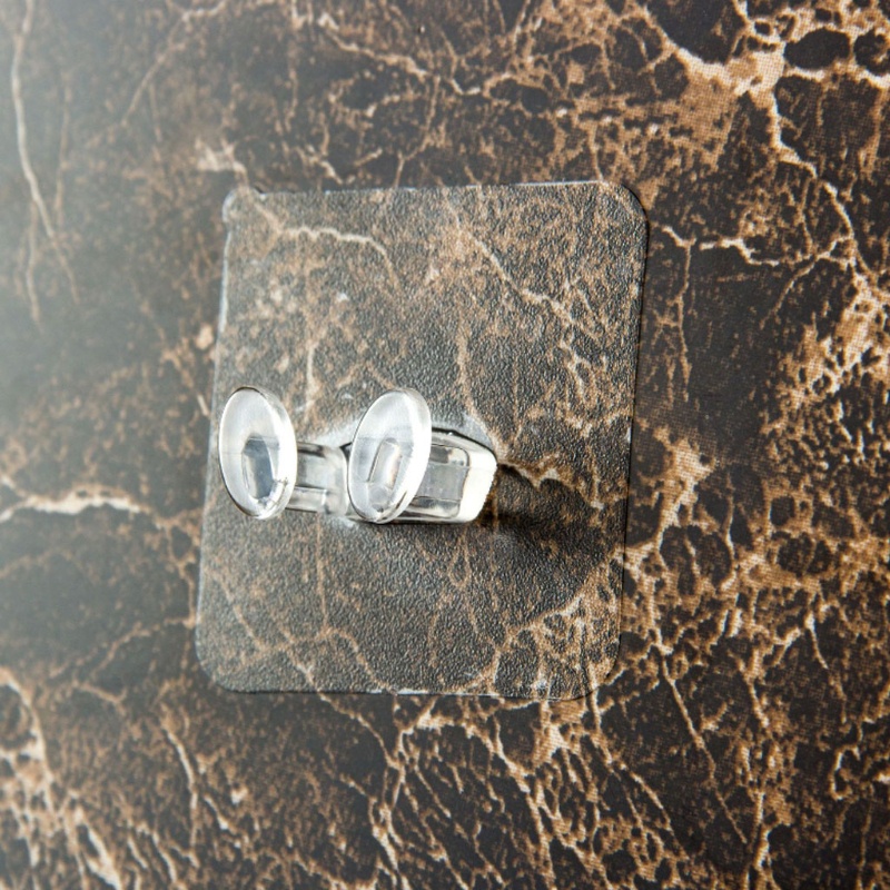 Giá đỡ phích cắm dán tường trong suốt tiện dụng