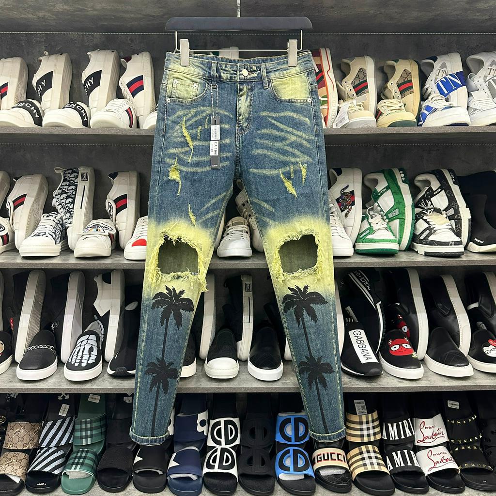 Quần jean bò nam Amiri skinny wash xanh vàng thủng gối tua viền dập hình cây dừa phong cách boy phố QJ227P