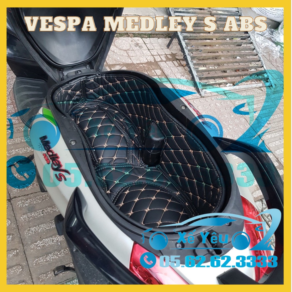 Vespa Medley S Abs - Lót cốp da chống sốc và cách nhiệt, có túi để giấy tờ tiện dụng.