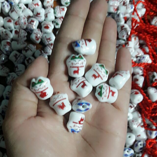 50 con mèo gốm sứ .