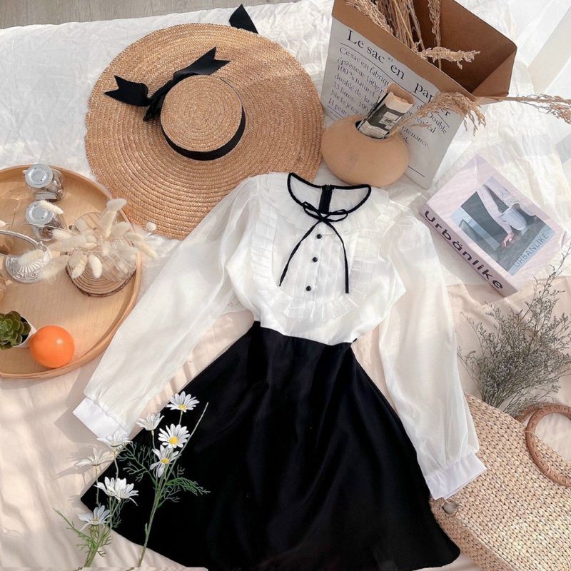 Đầm đen phối trắng cổ bèo nơ thắt