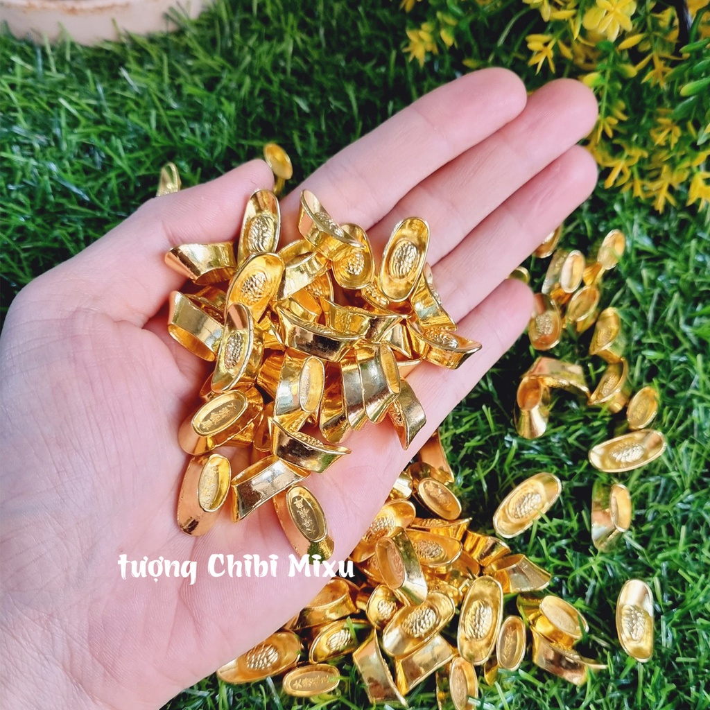 01 thỏi vàng Thần Tài kim loại size 20x10x7mm