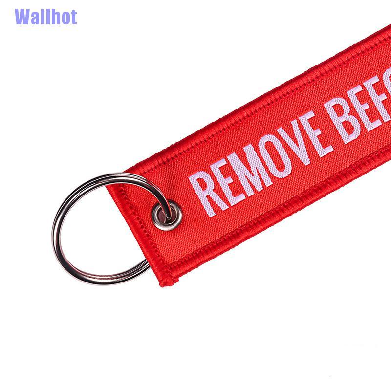 Móc khóa dải dây thêu chữ Remove Before Flight kích thước 13x3cm thời trang