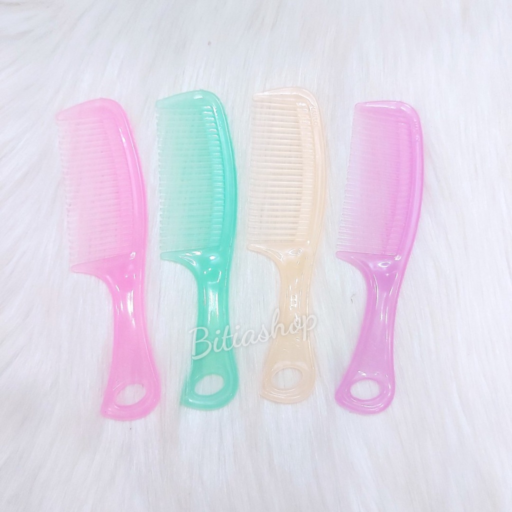 1 CÂY LƯỢC NHỰA MINI MÀU TRƠN BỎ TÚI