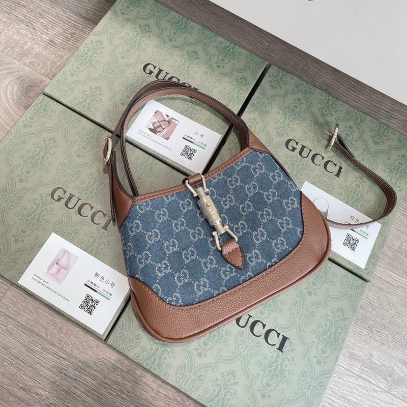 Túi cầm tay gc jackie