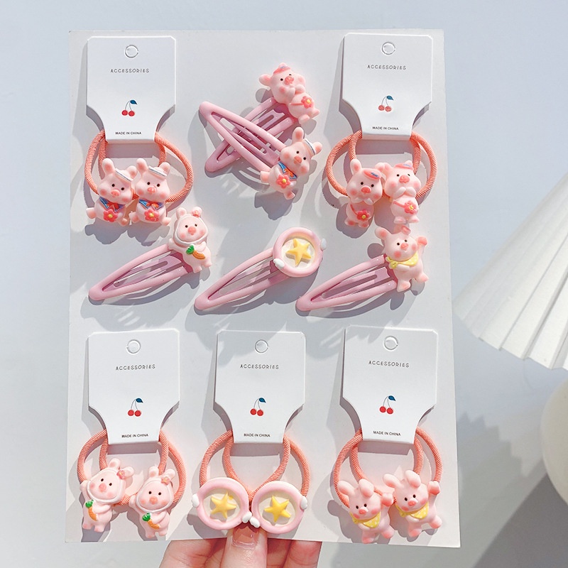 Dây thun cột tóc gắn hình chú heo hồng đáng yêu cho bé gái