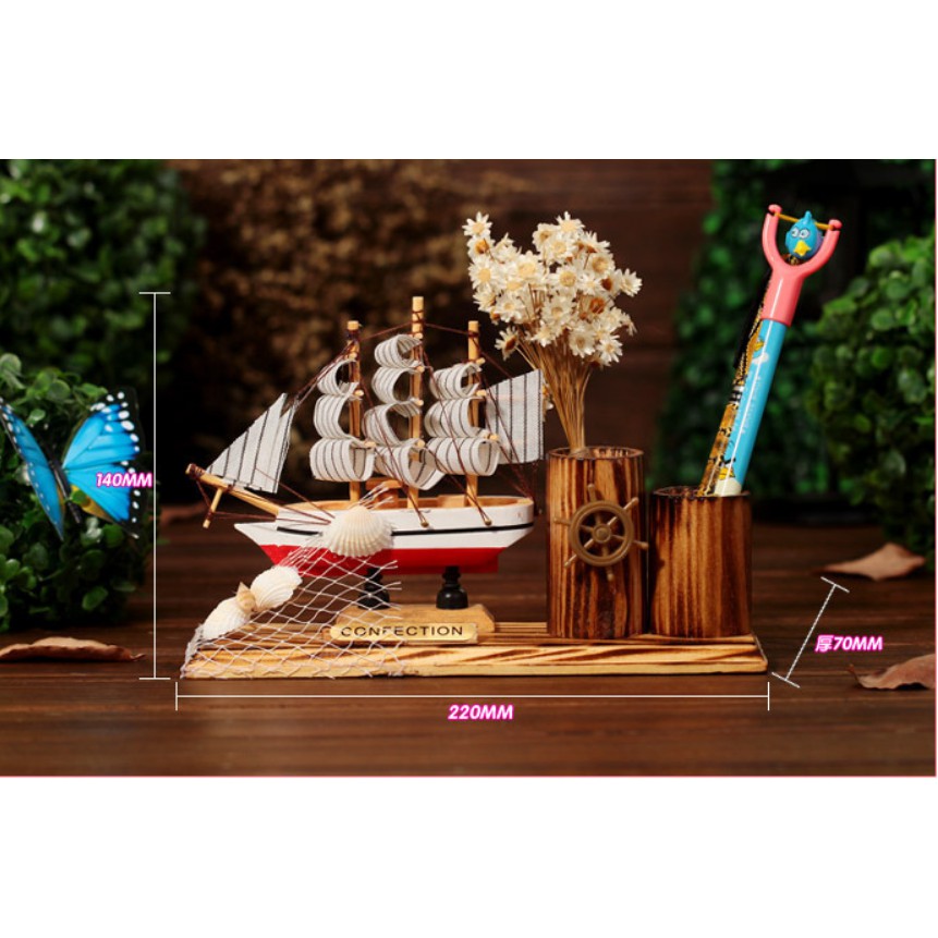 Thuyền buồm gỗ trang trí kèm lọ đựng bút và vật đụng làm quà tặng, vật trang trí rất ý nghĩa