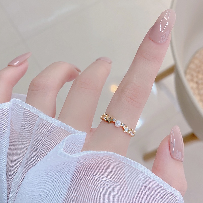 Nhẫn hở hình trăng sao đính ngọc trai xoay được phong cách Hàn Quốc
