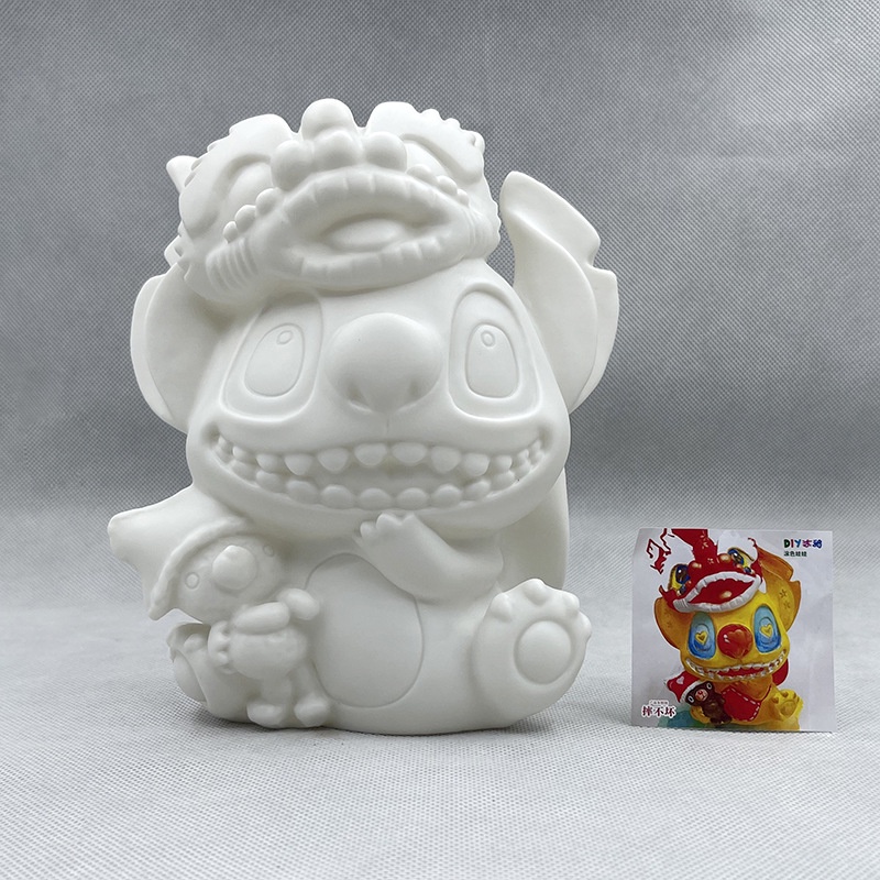 Tượng Stitch mẫu Tết tô màu bằng nhựa Vinyl + có nắp ống heo