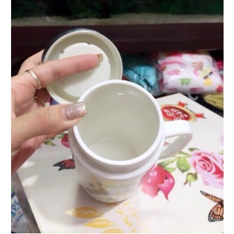 Ca cốc sứ giữ nhiệt nắp gương soi có quai ( giao hình ngẫu nhiên)
