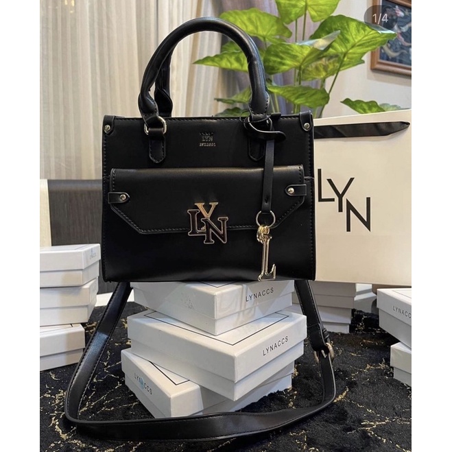 Túi lyn tay cầm màu đen