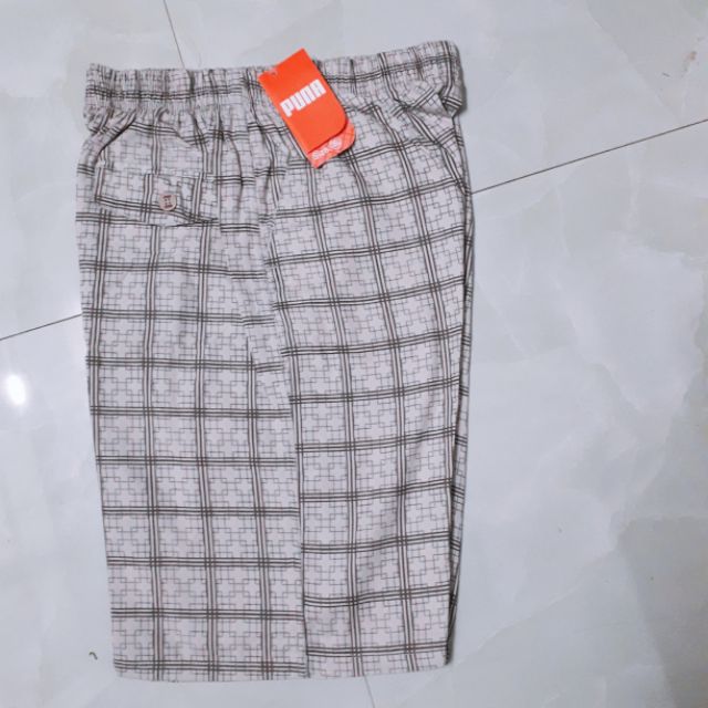 Quần sooc nam kẻ sọccaro cạp chun vải thô mặc ở nhà ,mặc như quần đùi ngủ.