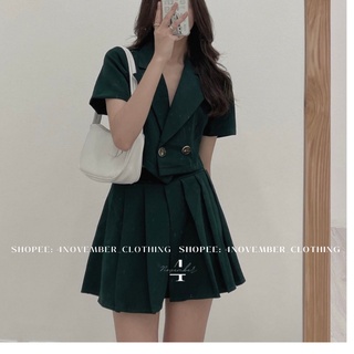 Set áo vest cộc tay kèm chân váy xếp ly dây thắt eo