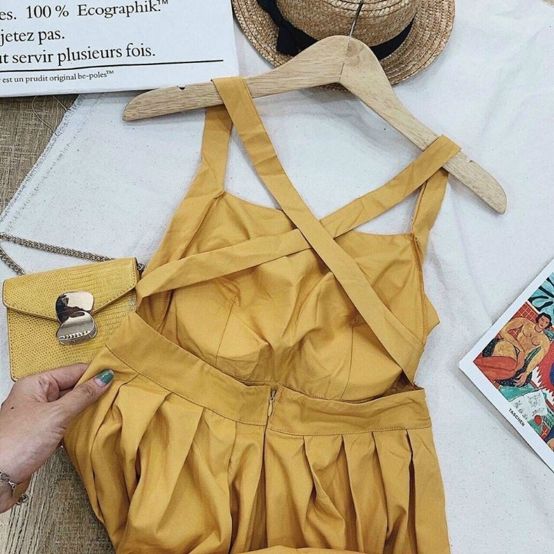 Đầm maxi vàng dây đan chéo lưng