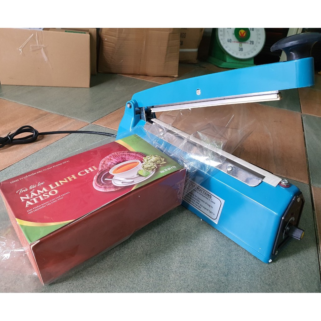 Máy Hàn Cắt Màng Co Dập Tây PFS200mm