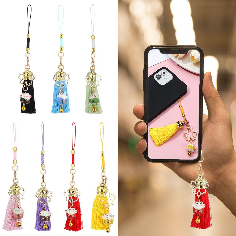 Dây Đeo Điện Thoại Chống Thất Lạc Hình Mèo May Mắn Phối Tua Rua Dễ Thương