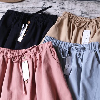 CHÂN VÁY MIDI NÚT GỖ ĐÍNH NƠ