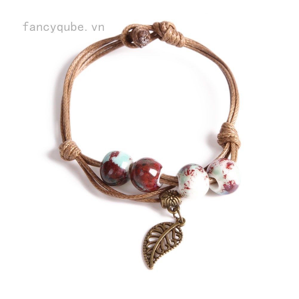 Vòng tay dây da 4 hạt sứ nhiều màu