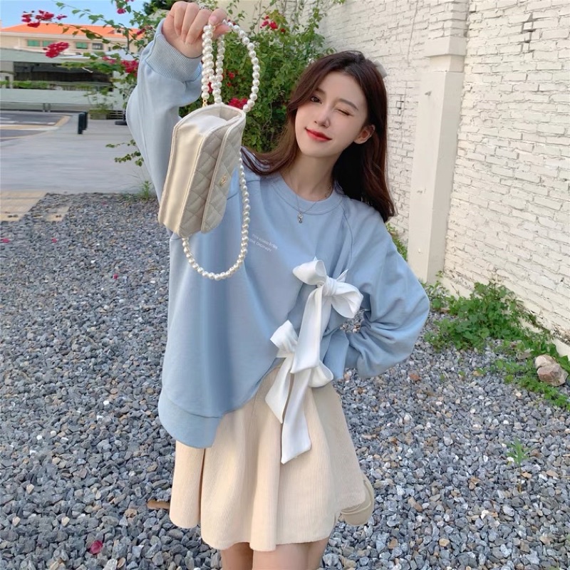 Áo len cột dây chéo