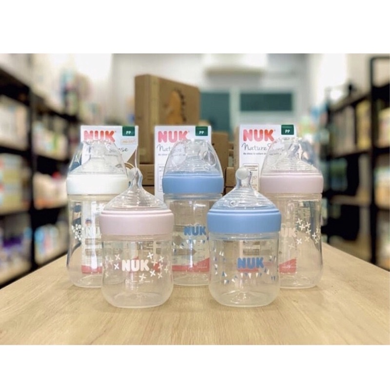 Bình sữa NUK PP Nature Sense núm ti Silicone