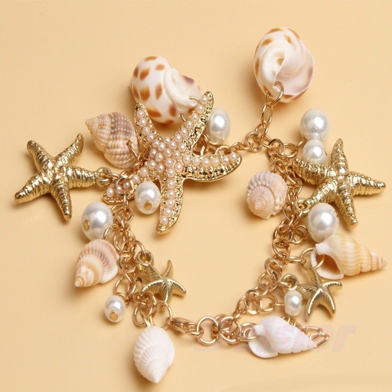 Vòng tay mạ vàng đính sao biển vỏ ngọc trai