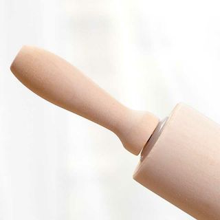 Dụng cụ chày cán bột gỗ trục xoay