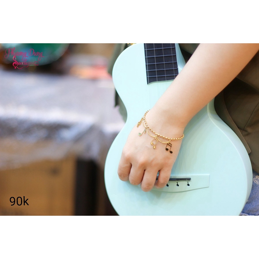 Vòng tay 4 nốt nhạc - màu vàng và màu trắng