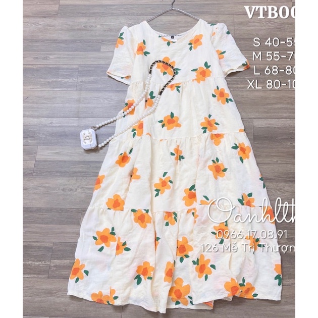 Đầm bầu mùa hè - váy bầu dáng babydoll trắng điểm hoạ tiết hoa vàng lịch sự trẻ trung
