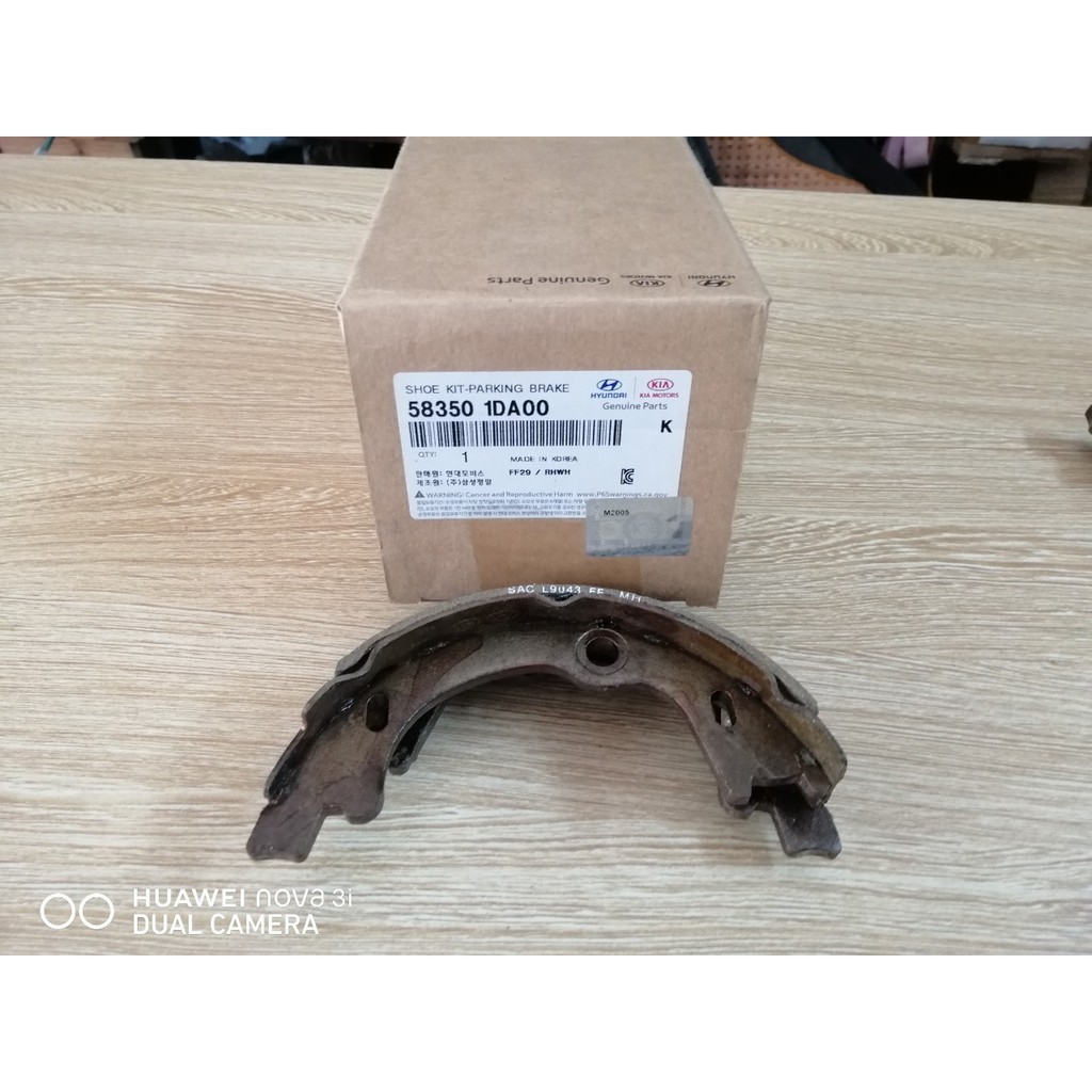 Má phanh guốc Kia Carens