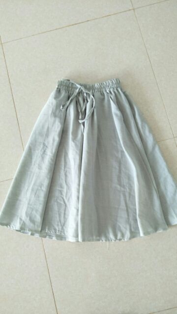 Chân váy xòe 2 túi trước màu xanh