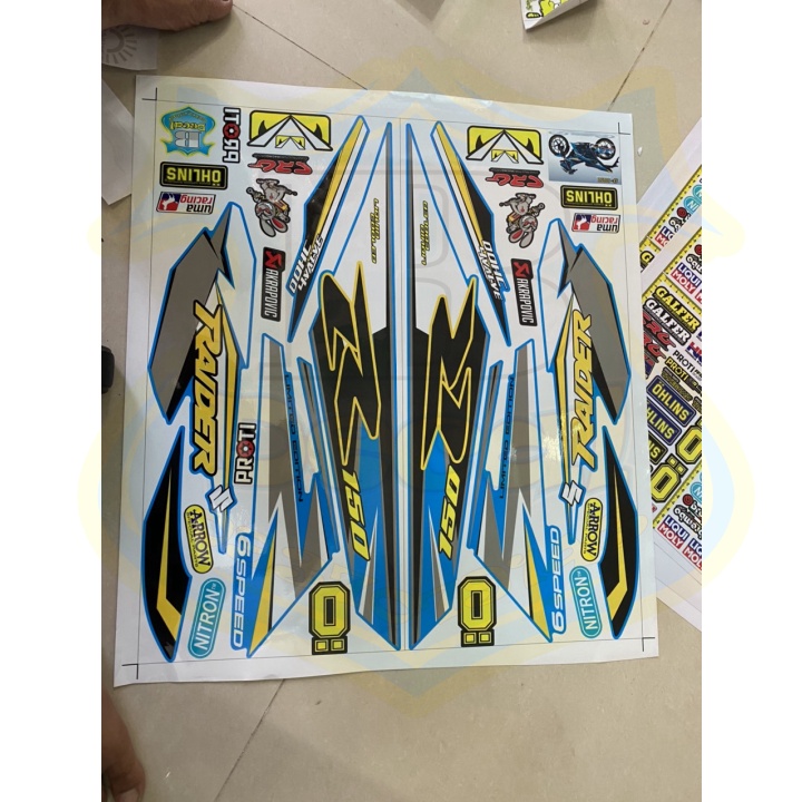 ( Quí khách vui lòng mang ra tiệm cho thợ dán ) Tem Raider Fi xanh ngọc