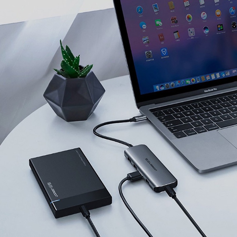 Ugreen 50980 - Hub USB Type C ra 4 cổng USB 3.0 hỗ trợ nguồn phụ chính hãng