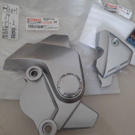 Cặp ốp nhựa che nhông mang cá, giò đạp xe EXCITER 2005-2010 bạc zin