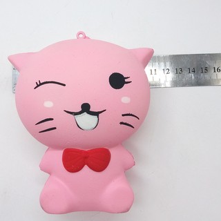squishy MÈO CƯỜI ĐEO NƠ
